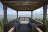 Covered lakeside gazebo, ideal for enjoying sunrises and capturing beautiful photos.