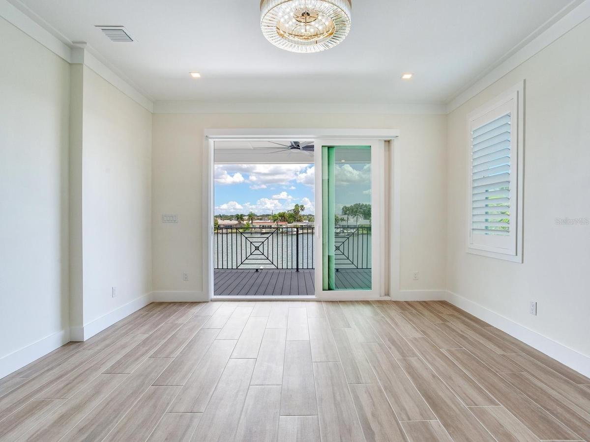 Bedroom of an already built SeaSafe Shore Crest home for reference purposes only.