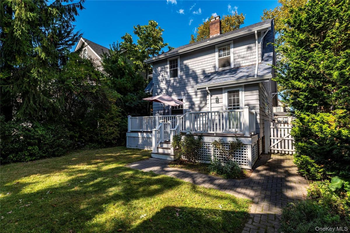 Rear Entry, back Trek deck, and level private back yard.