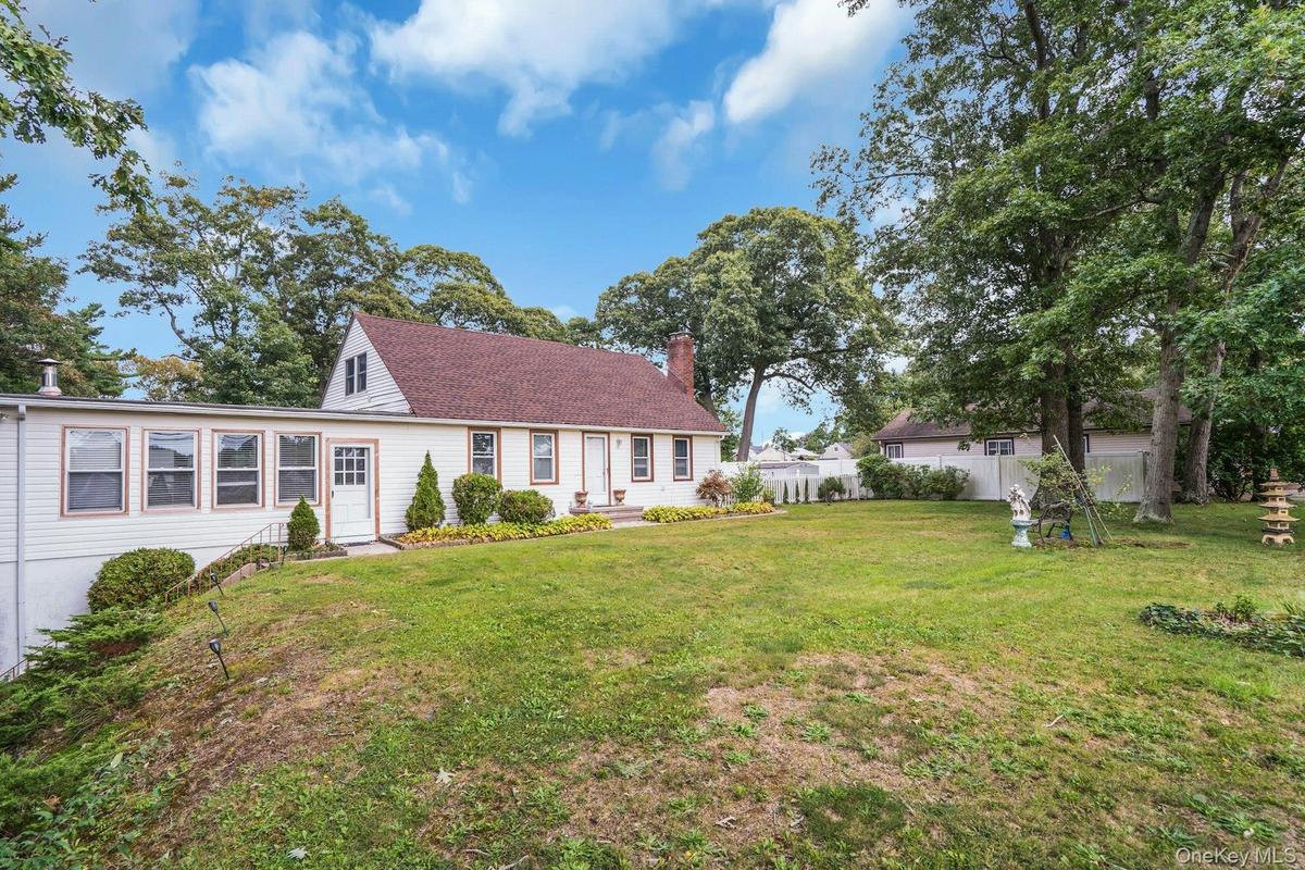 Over a half acre of secluded rolling lawns.