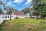 Over a half acre of secluded rolling lawns.