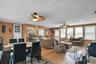 Hardwood Flooring and walls of windows.