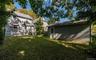 yard with house and garage
