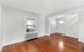 living room, radiator heating. entrance way and stairway