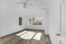 Primary BedroomLuxury Vinyl Flooring, Recessed Lighting and Ceiling Fan