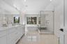 Luxurious primary bathroom with soaking tub, large, walk-in shower and double sink vanity.