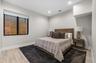 Recessed lighting illuminates the room,
