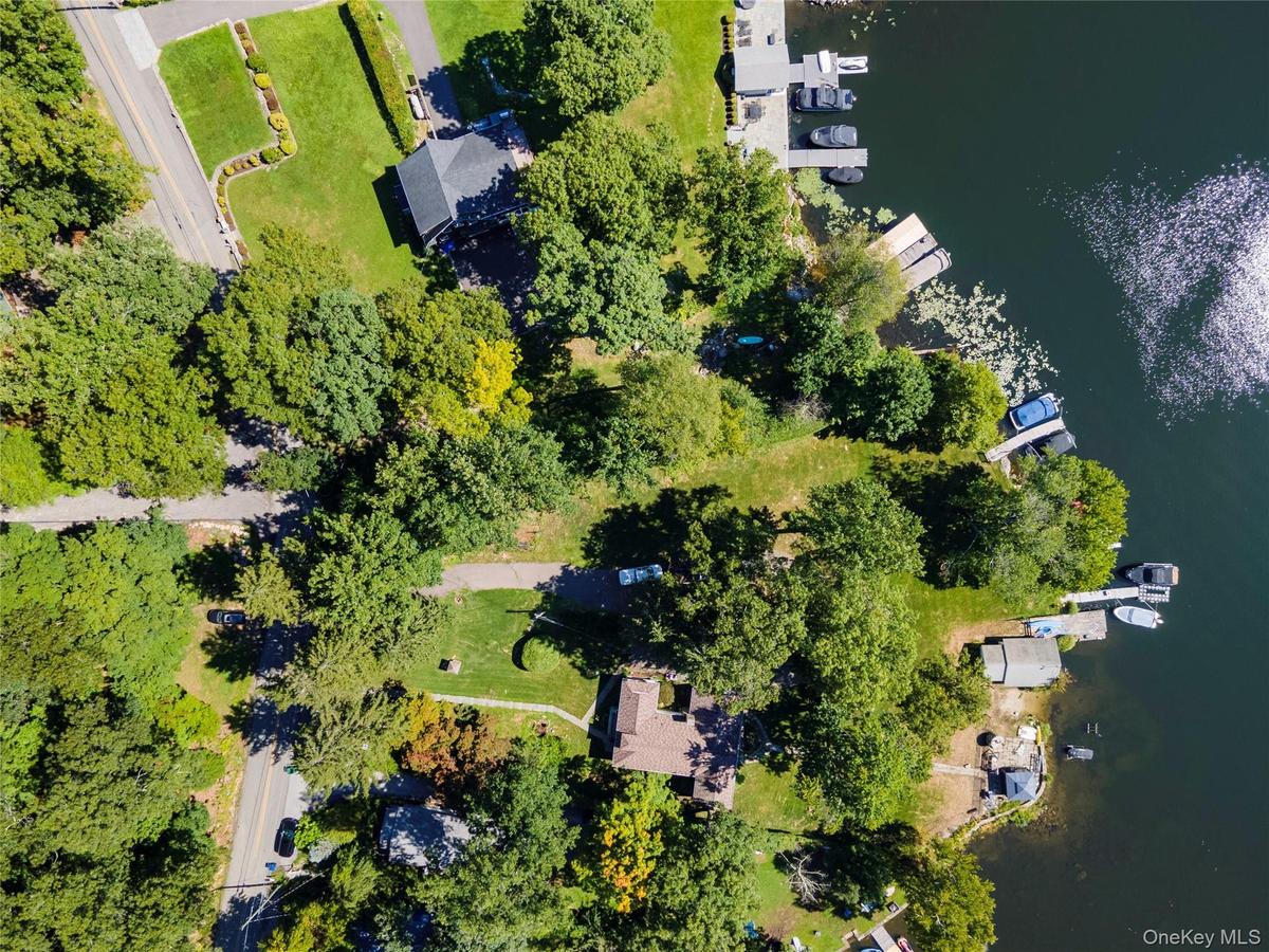 Extra lot with Oscawana Lake access. Down the road and across the street.