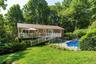 Back yard with Deck and inground pool.