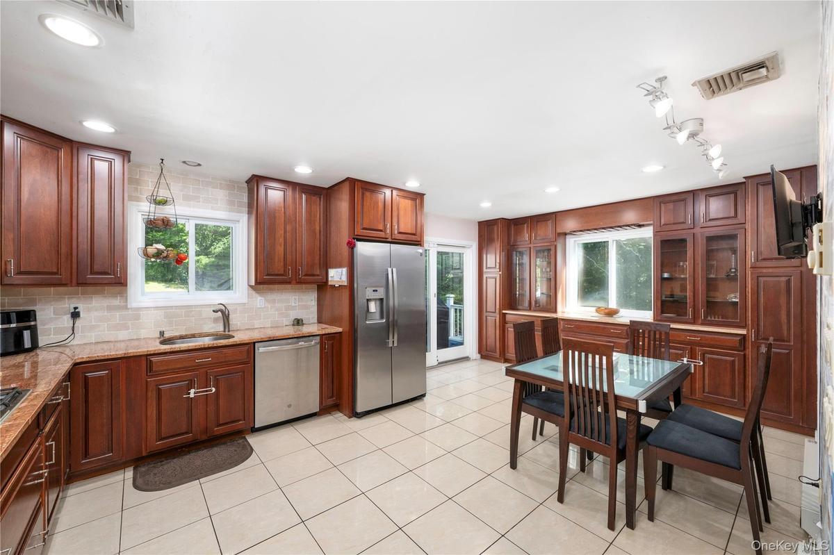 Kitchen with sliders walk out to the back deck.