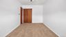 Recessed lighting fixture, light brown carpet flooring, and white painted walls