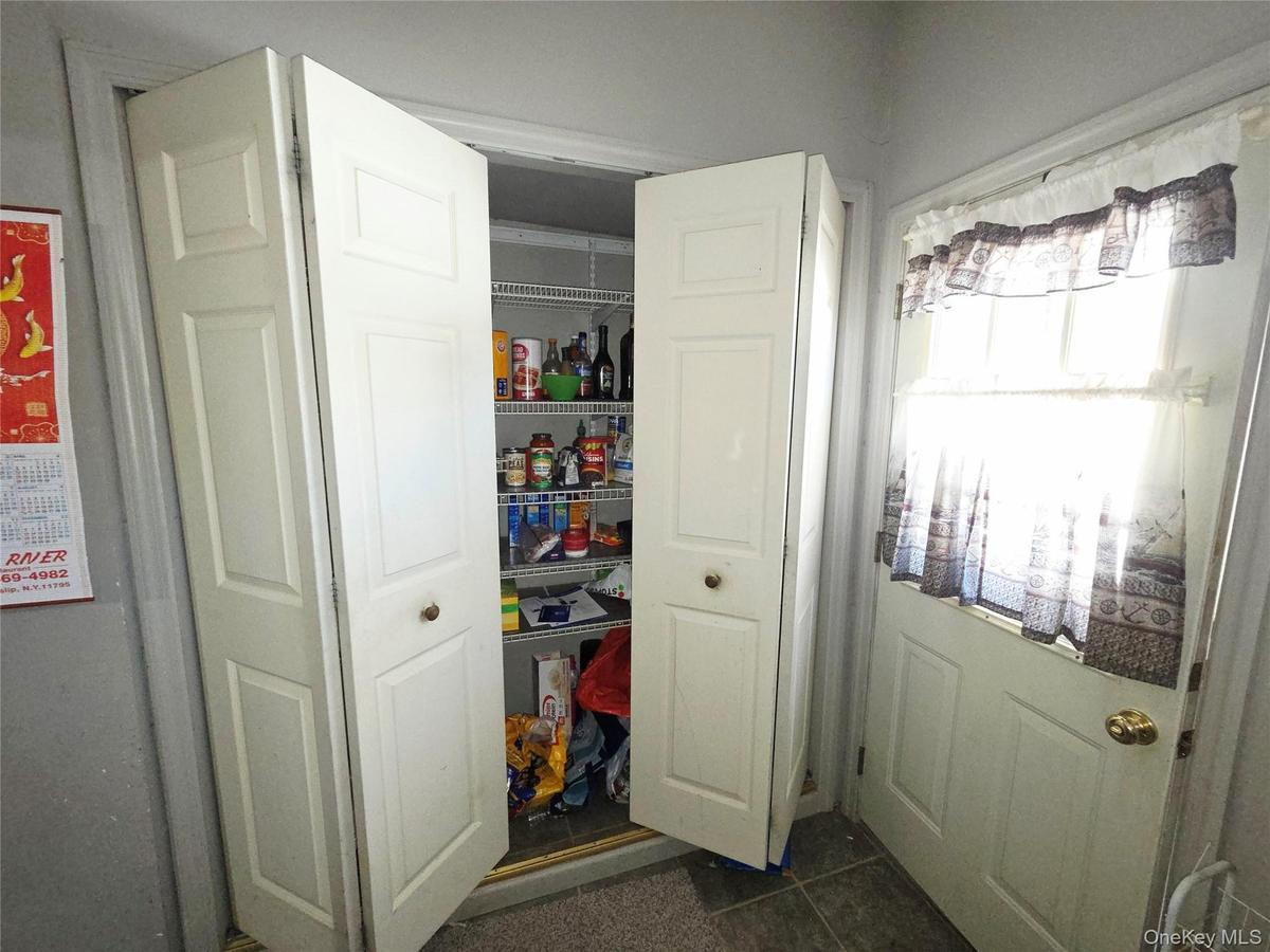 Food pantry by back door & another pantry by front door