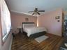 You have many option with this space! Off front door entry used as bedroom.