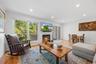 Enjoy the Fireplace or views of the wooded backyard from the comfort of your home