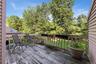 Wood Deck with peaceful view of yard and trees