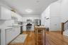 Alternate view of the Kitchen with the Laundry Closet on the right