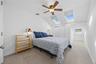 Second Bedroom with ceiling fan, double wide closet & 3 skylights