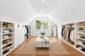 Virtually staged upstairs closet