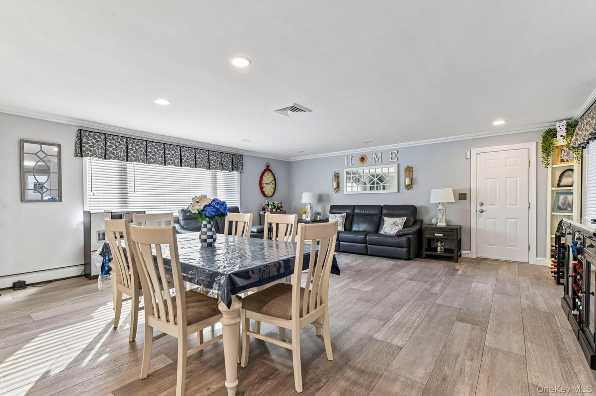 Open concept to adjoining kitchen.