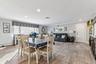 Open concept to adjoining kitchen.