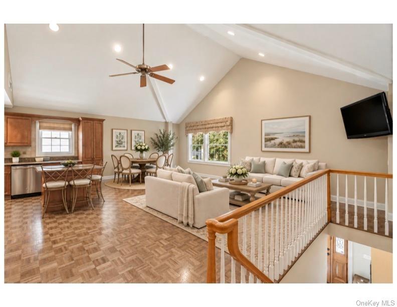 Virtually Staged Upper Living Room with Bar and Gaming Table