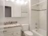 Bath located across from the second bedroom