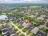 Aerial view of the home and surrounding area