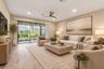 Great room with sliding glass doors to lanai