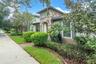 Front yard with landscaping and walkway