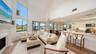 ENJOY THE SOFLTY FURNISHED GREAT ROOM ENJOYING A MOVIE