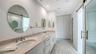 DUAL VANITIES & A SEPARATE LINEN CLOSET