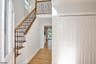 Foyer with souring ceiling!