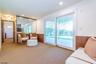 Den out to expansive patio