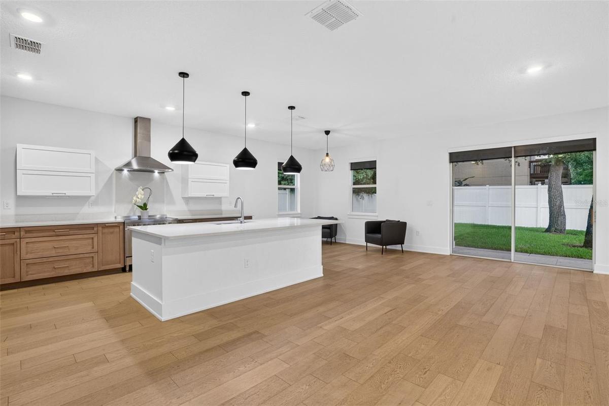 Open Floor Plan Sliders to back yard and covered porch area.