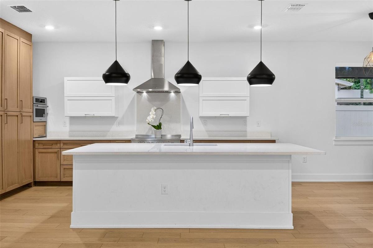 Large Quartz Island Room for Barstools and Prepping Food