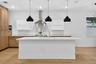 Large Quartz Island Room for Barstools and Prepping Food