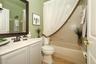 Guest bathroom at front of home