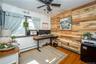 One of the bedrooms is currently being used as a home office.