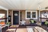 From the moment you step onto the inviting covered front porch, the property delivers warmth, character, and incredible flexibility.