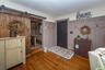 Inside, the spacious living room greets you with hardwood floors.