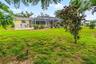 Rear exterior and backyard lawn.