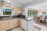 Kitchen adjoining the Florida room dining area.