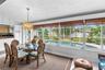Florida room dining area with pool views.