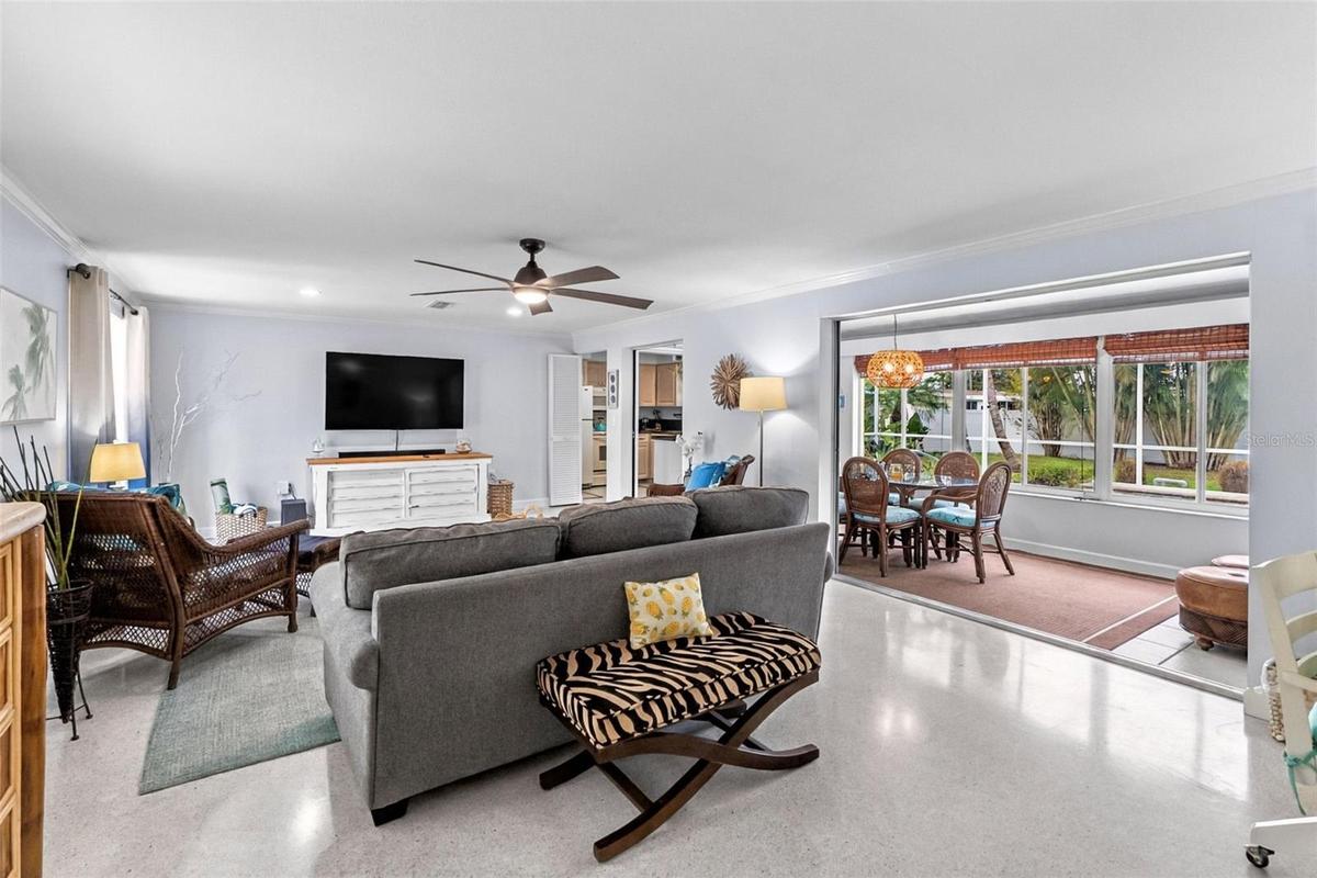 Living room opening to the adjoining Florida room.