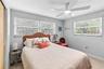 Guest bedroom with windows on two sides.