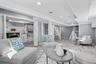 Finished basement space with laundry and access to tandem 2 car garage