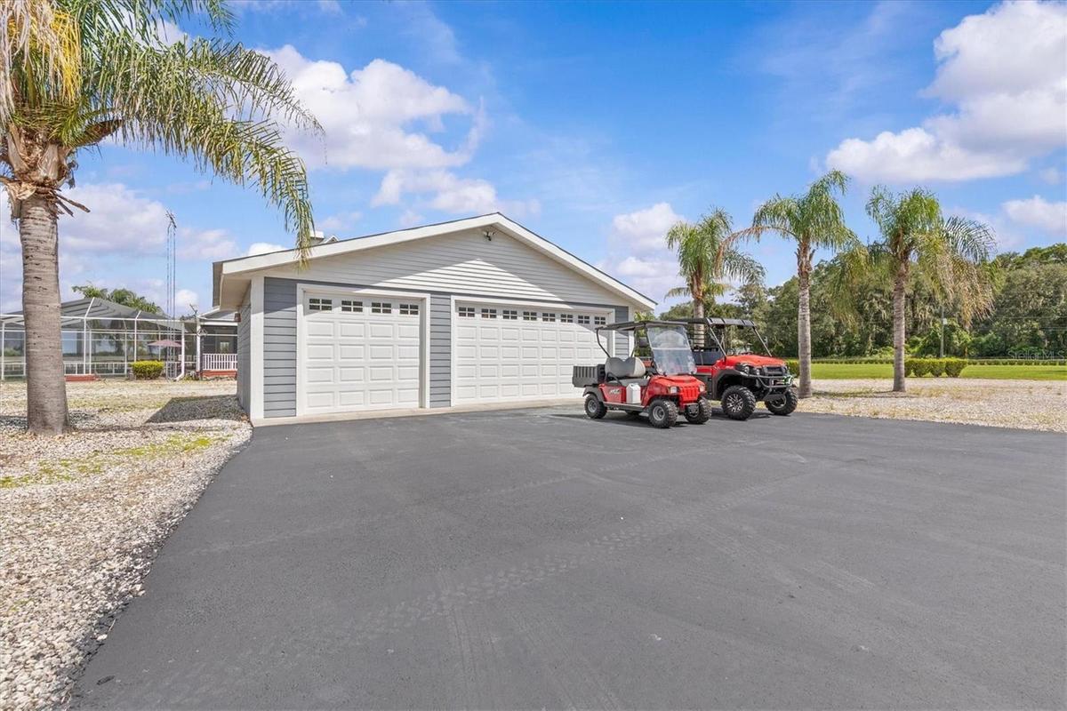 3 Car Detached Garage with 2 Golf Carts