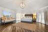 Primary suite: Spacious coastal retreat with ocean views, two large walk-in closets, and access to an oversized composite terrace overlooking the Atla