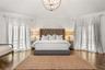 Primary suite: Spacious coastal retreat with ocean views, two large walk-in closets, and access to an oversized composite terrace overlooking the Atla
