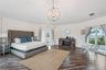 Primary suite: Spacious coastal retreat with ocean views, two large walk-in closets, and access to an oversized composite terrace overlooking the Atla